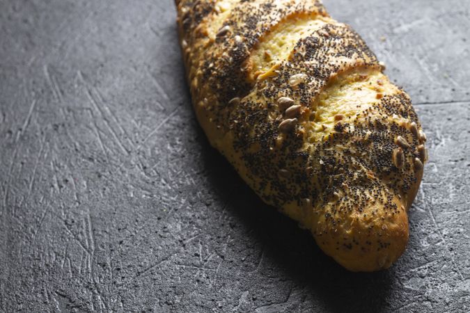 Loaf of bread with grains and poppy seeds