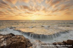 Time lapse photography of wave crashing during sunset 5qQgJ5