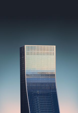 Reflective solo building against the night sky