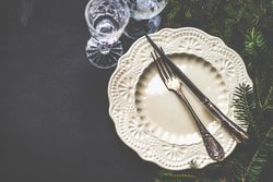 Christmas table setting with crystal wine glasses