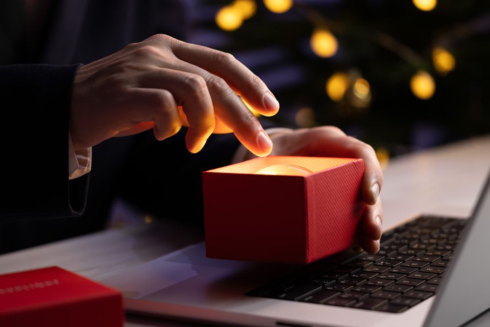 Businessman Reaching Into Glowing Sphere