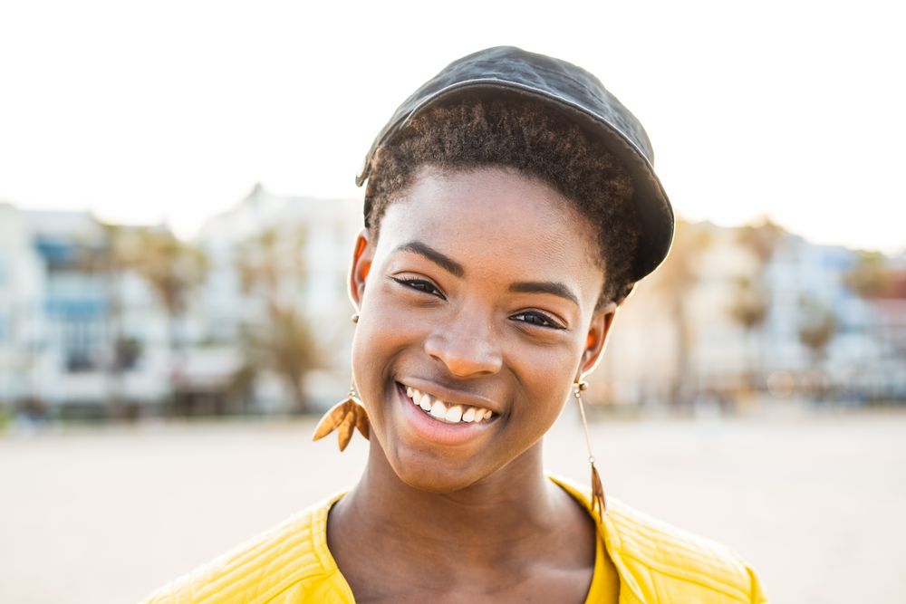 Joyful female smiling at camera