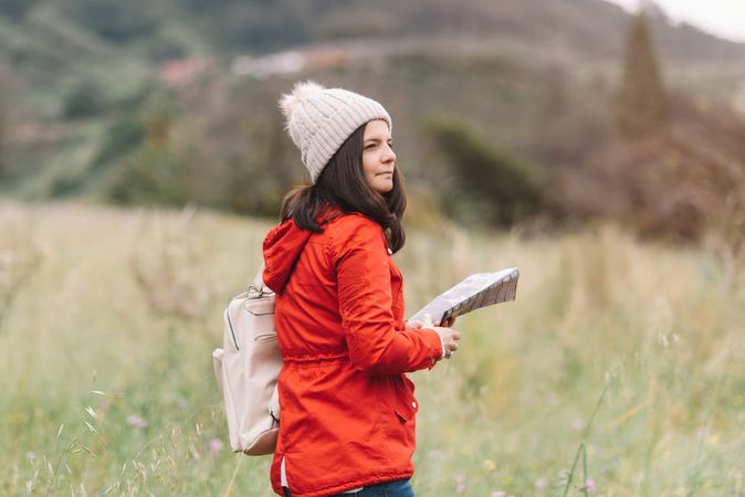 Female traveler with guide in countryside