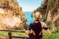 Female tourist contemplating picturesque landscape