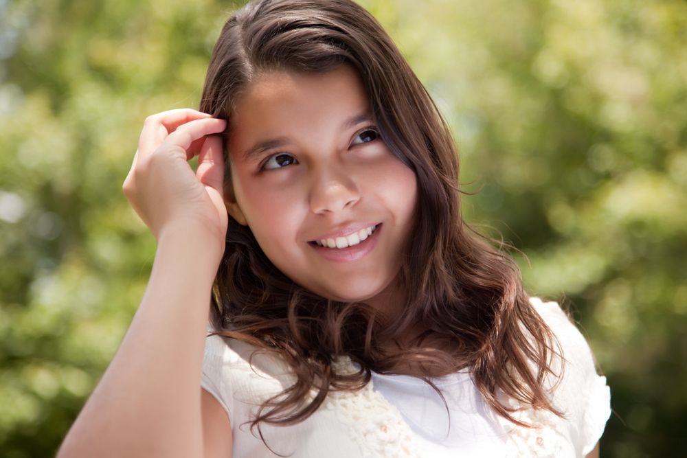 Cute Happy Hispanic Girl in the Park