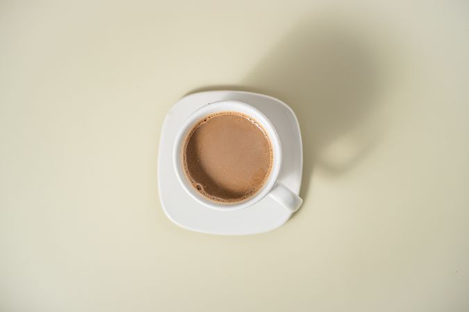 Flat lay of a ceramic cup of coffee