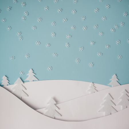 Christmas winter landscape with snowy hills and trees