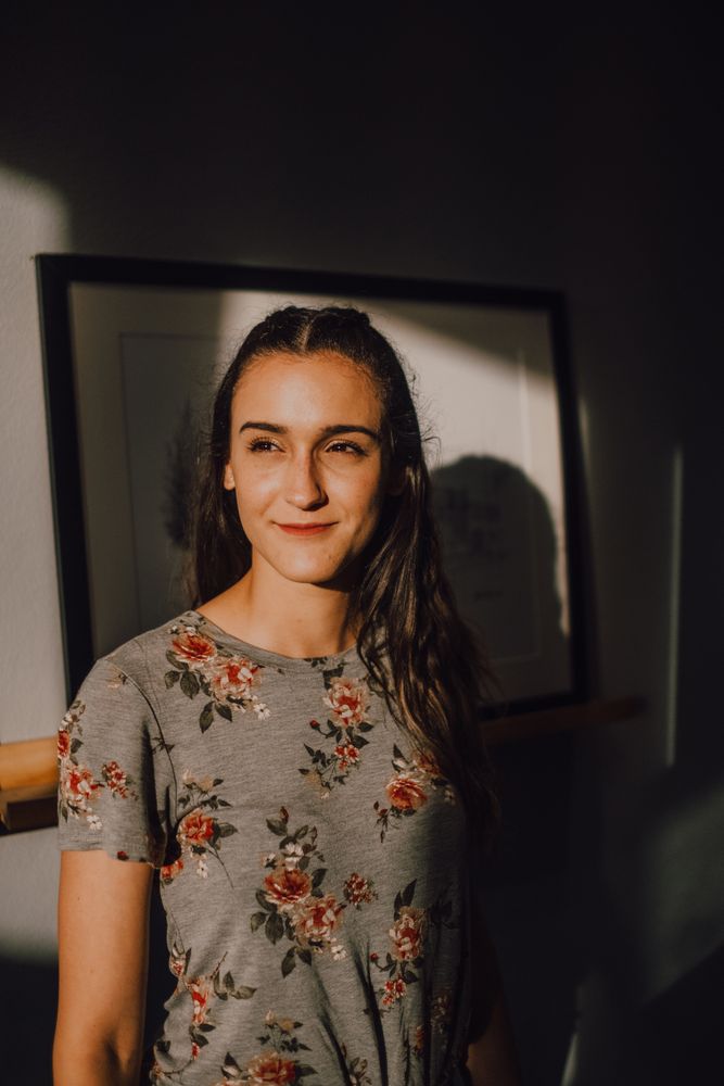 Woman standing near wall