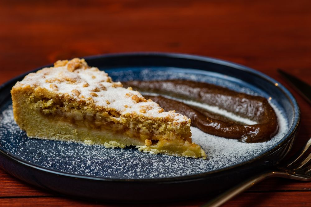Slice of Apple pie with sugar