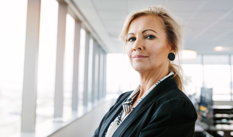 Mature businesswoman looking at camera confidently