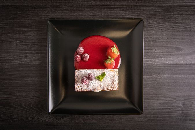 Diphlomate cream and red fruit strudel in elegant plate