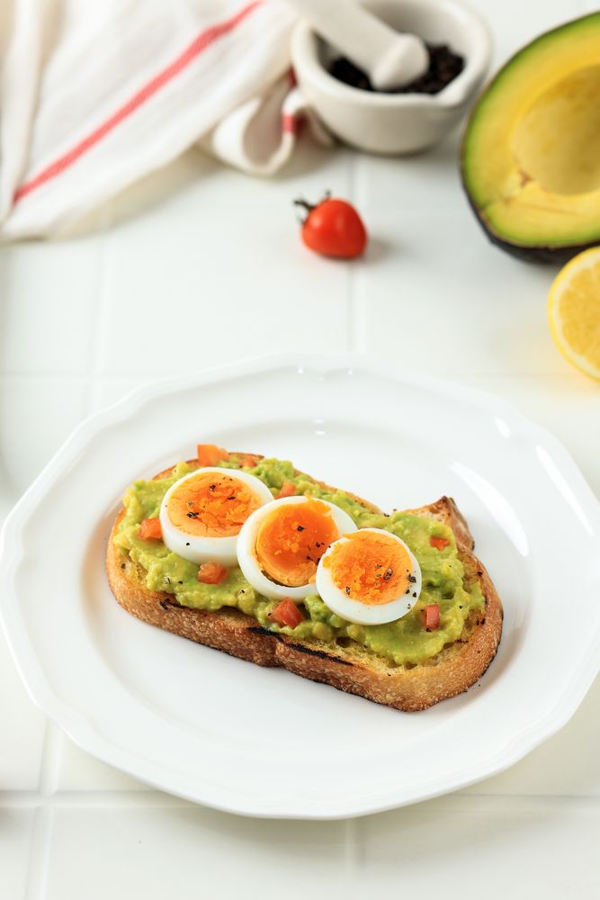 Sourdough Bread with Mashed Avocado and Sliced Boiled Egg