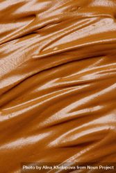 Texture of brown whipped chocolate, caramel or coffee cream, top view 4AEkQ4