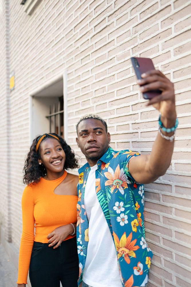 Friends taking a selfie in the street