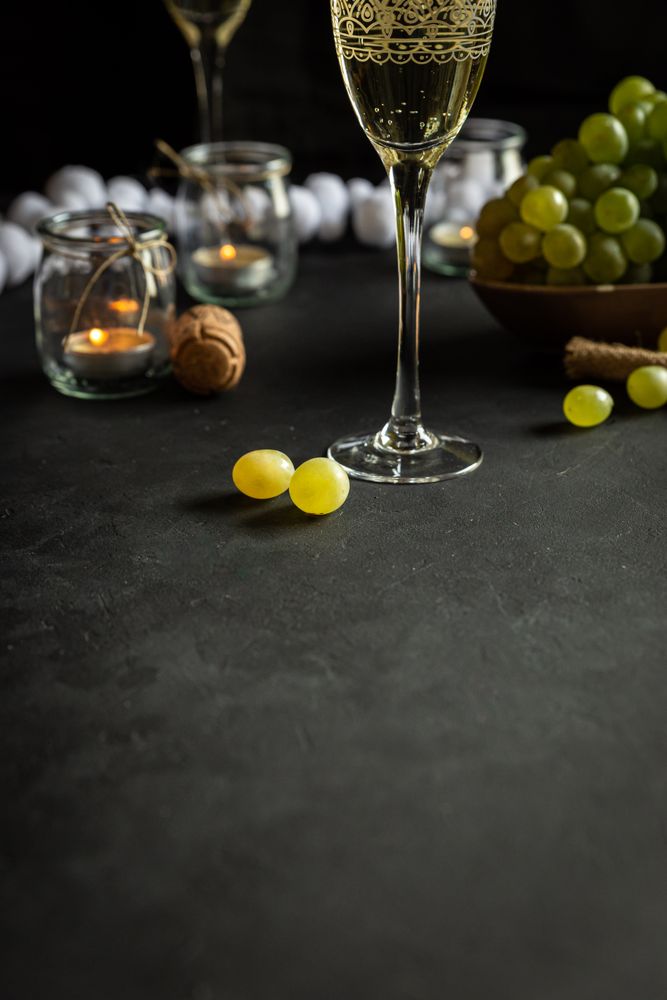 Glasses with wine and grapes
