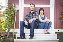 Interracial Couple Relaxing on the Steps