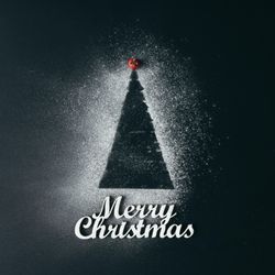 Christmas tree with sugar snow on dark background