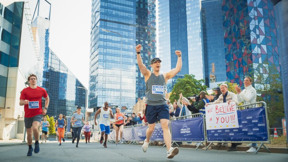 Portrait of a Smiling Group of People Participating in a City Marathon.