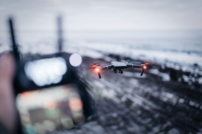 Drone flying near sea