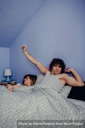 Man waking up while his wife sleeps bE9R7n