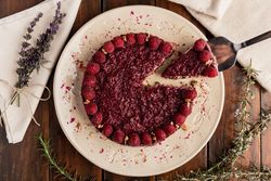 Fruit berry pie and branch of lavender on table