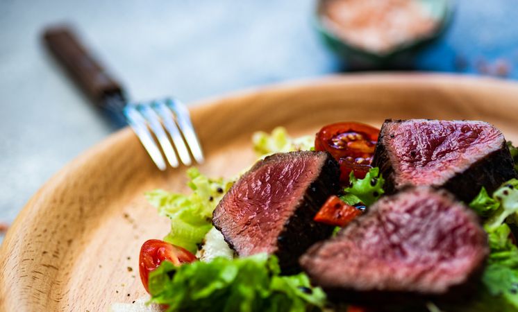 Close up of steak salad with fresh lettuce