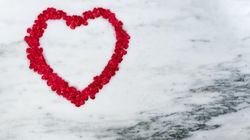 Red Large outline of heart for the Valentine’s day holiday on marble stone