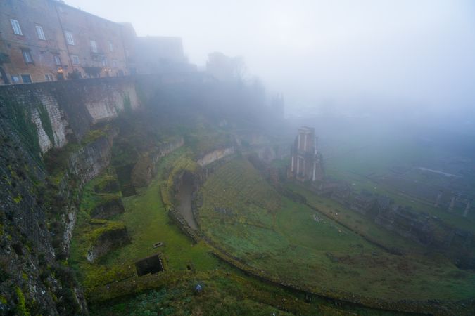 Majestic view of ancient ruins in fog