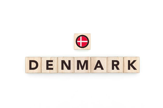Wooden blocks bearing the name and flag of Denmark.