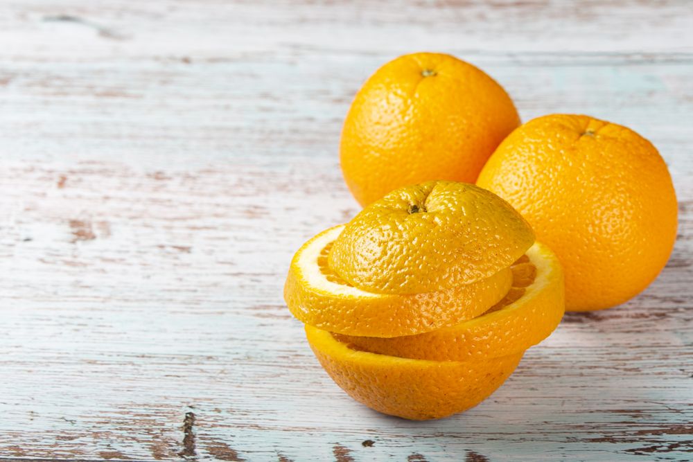 Sliced oranges on the table.