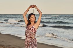 Woman with dress at the beach