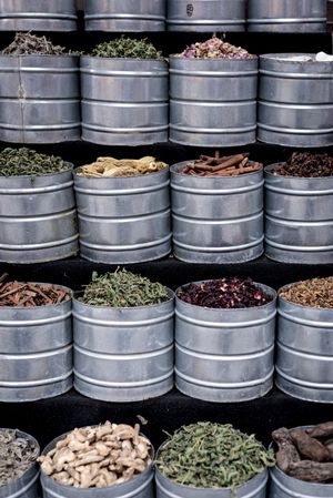Metal containers with herbs