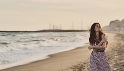 Woman with dress at the beach