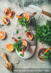 Fresh summer cocktail drink with citrus and herbs 0WREMb