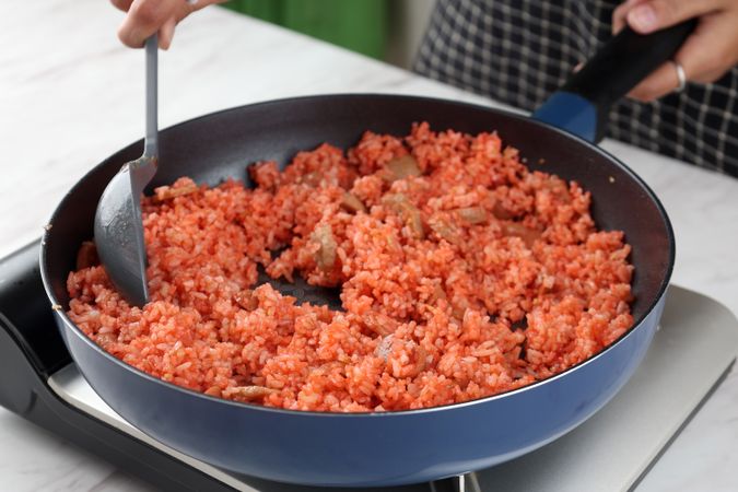 Cooking Process Making nasi Goreng Merah or Red Fried Rice from Makasar