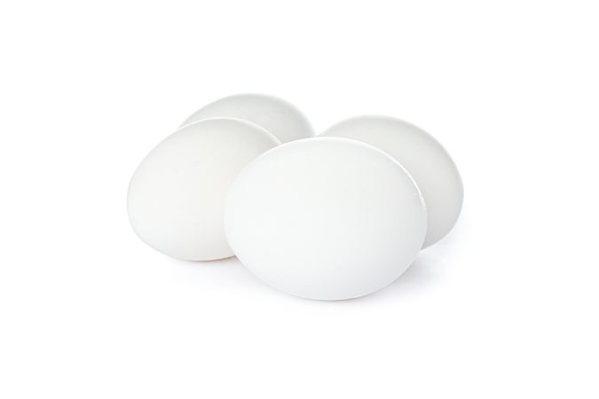 chicken eggs isolated on plain background