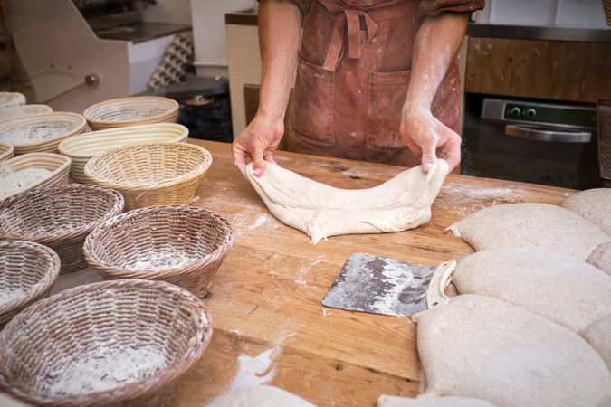 Leavened bread dough in the moulds resting to be baked.