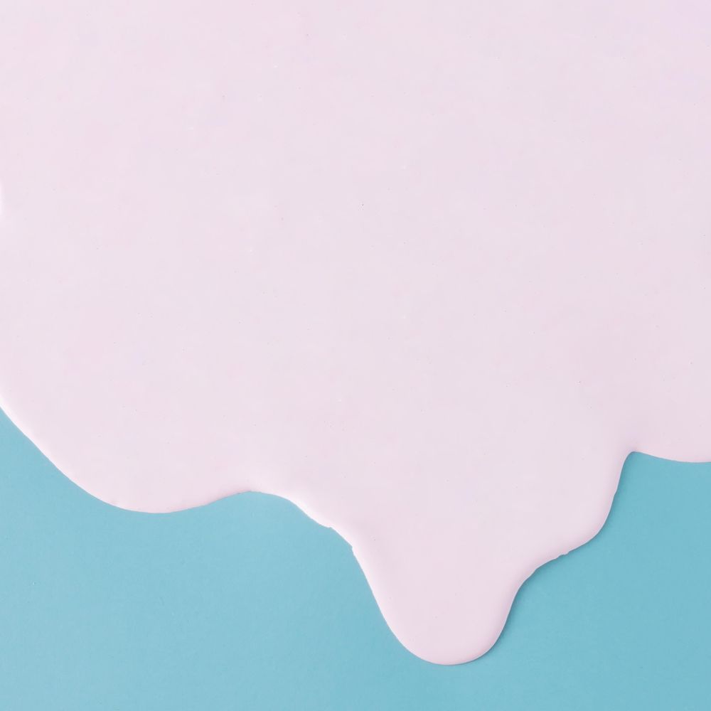 Abstract pink oil paint dripping texture on blue canvas