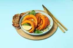 Concept of tasty homemade dish - baked pumpkin