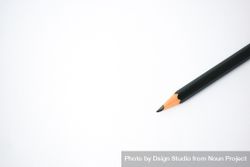 Sharpened pencil on table with copy space 0Ldr8R