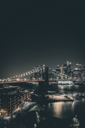 Brooklyn bridge at night in New York city, NY, US