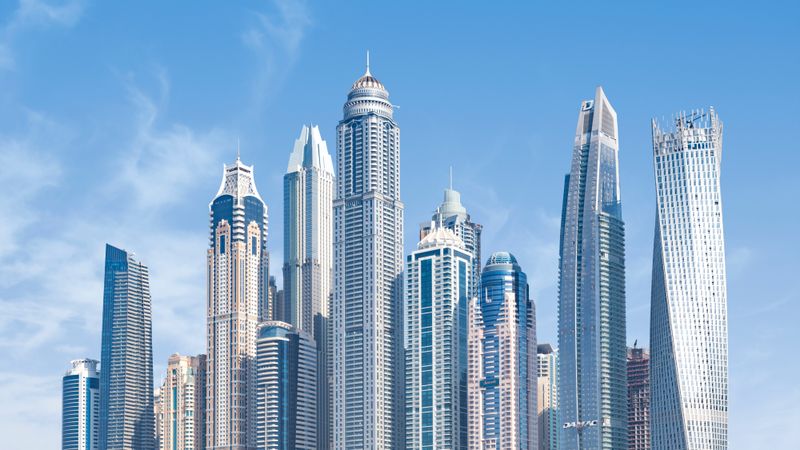 Zero Gravity Dubai buildings under blue sky
