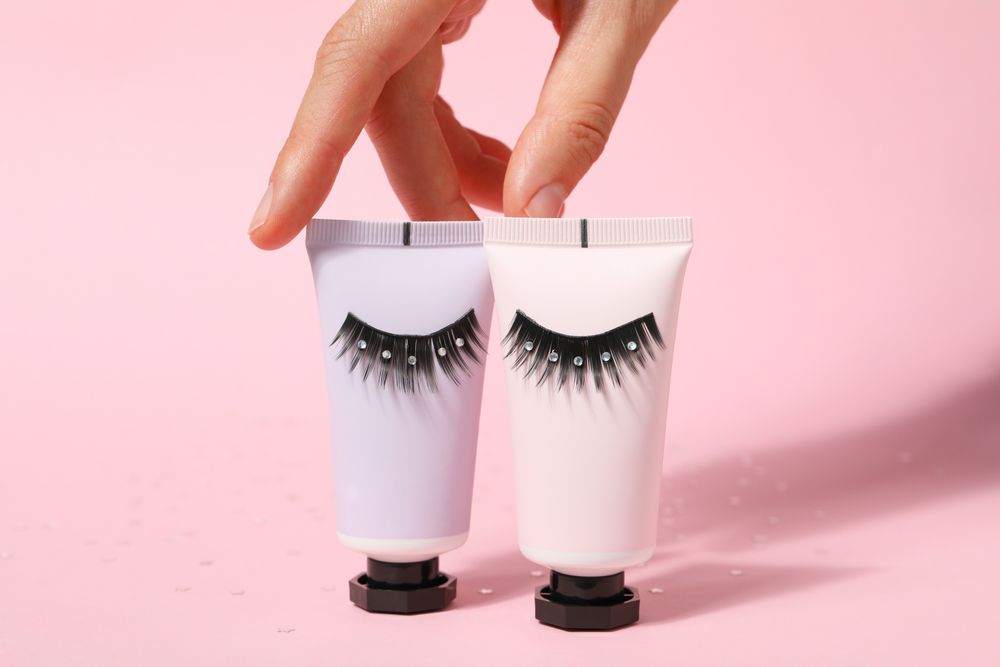 concept of cosmetology tools and beauty treatment, false eyelashes