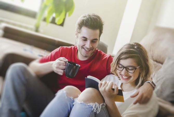 Couple sitting at couch together