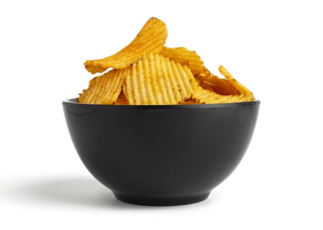 potato chips on bowl blank background