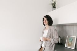 Pensive woman at home