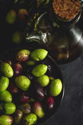 Fresh Spanish extra virgin olive oil with olives