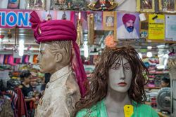 Two mannequin heads in store