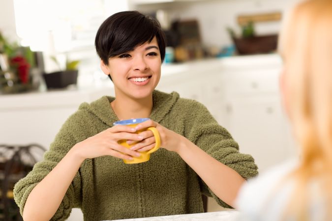 Young Woman Socializing with Friend