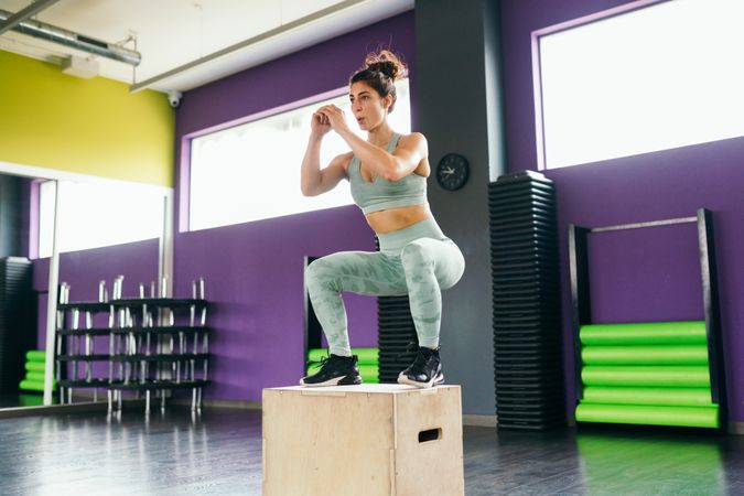 Woman doing box jumps